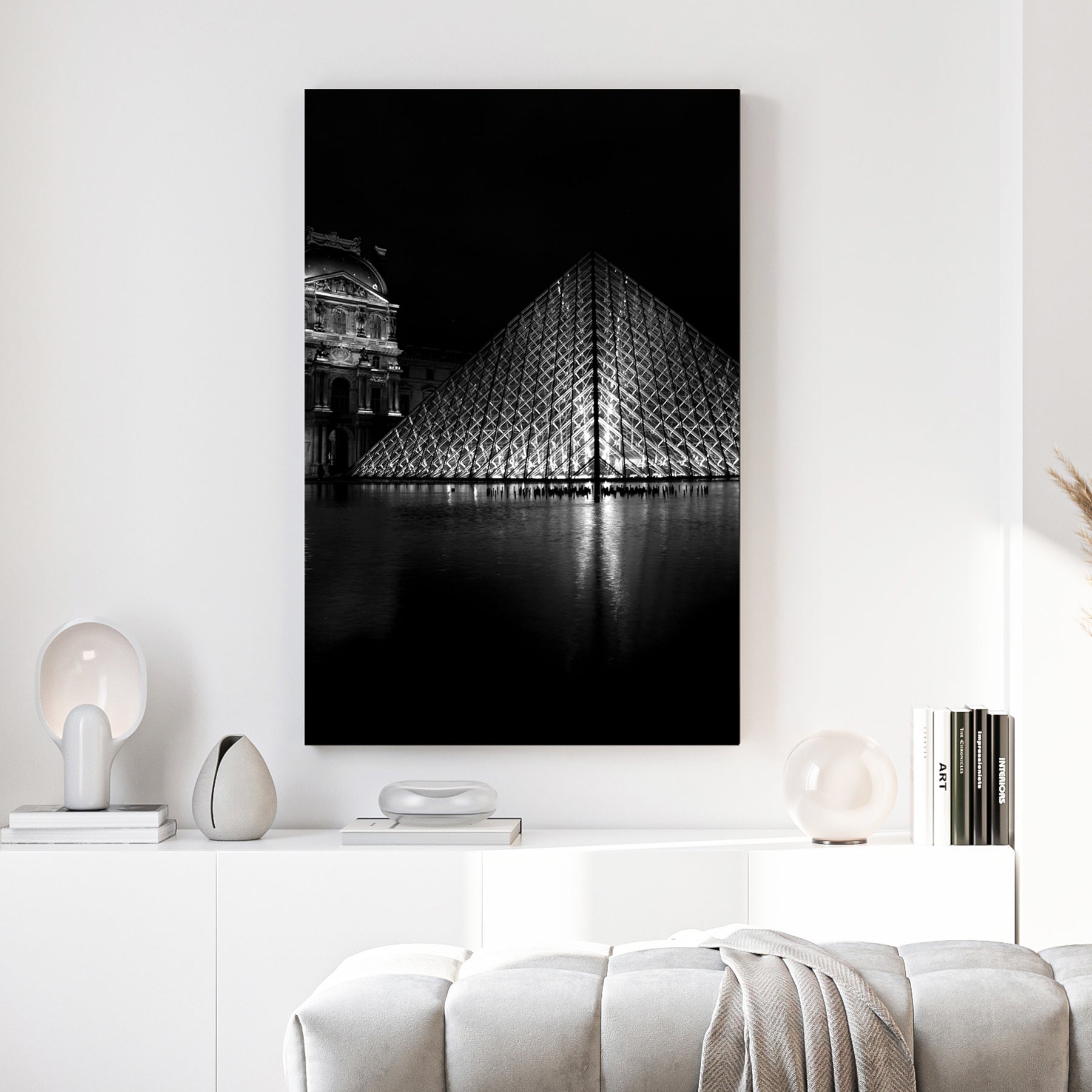 Louvre Pyramid Paris canvas wall art print above a sofa in a contemporary living room