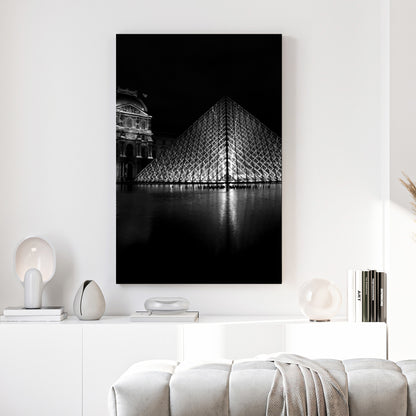 Louvre Pyramid Paris canvas wall art print above a sofa in a contemporary living room