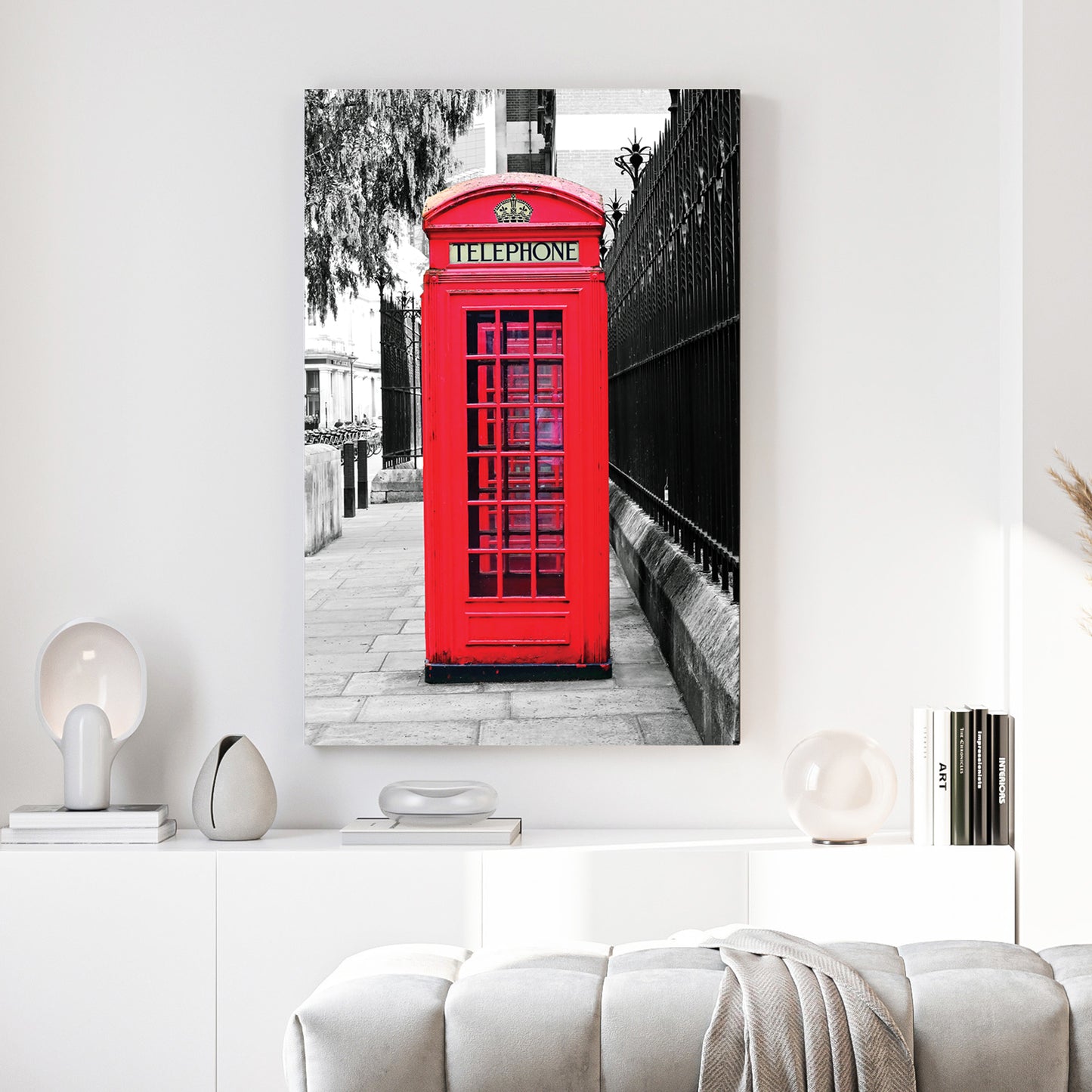 London Telephone Box canvas wall art print above a sofa in a contemporary living room