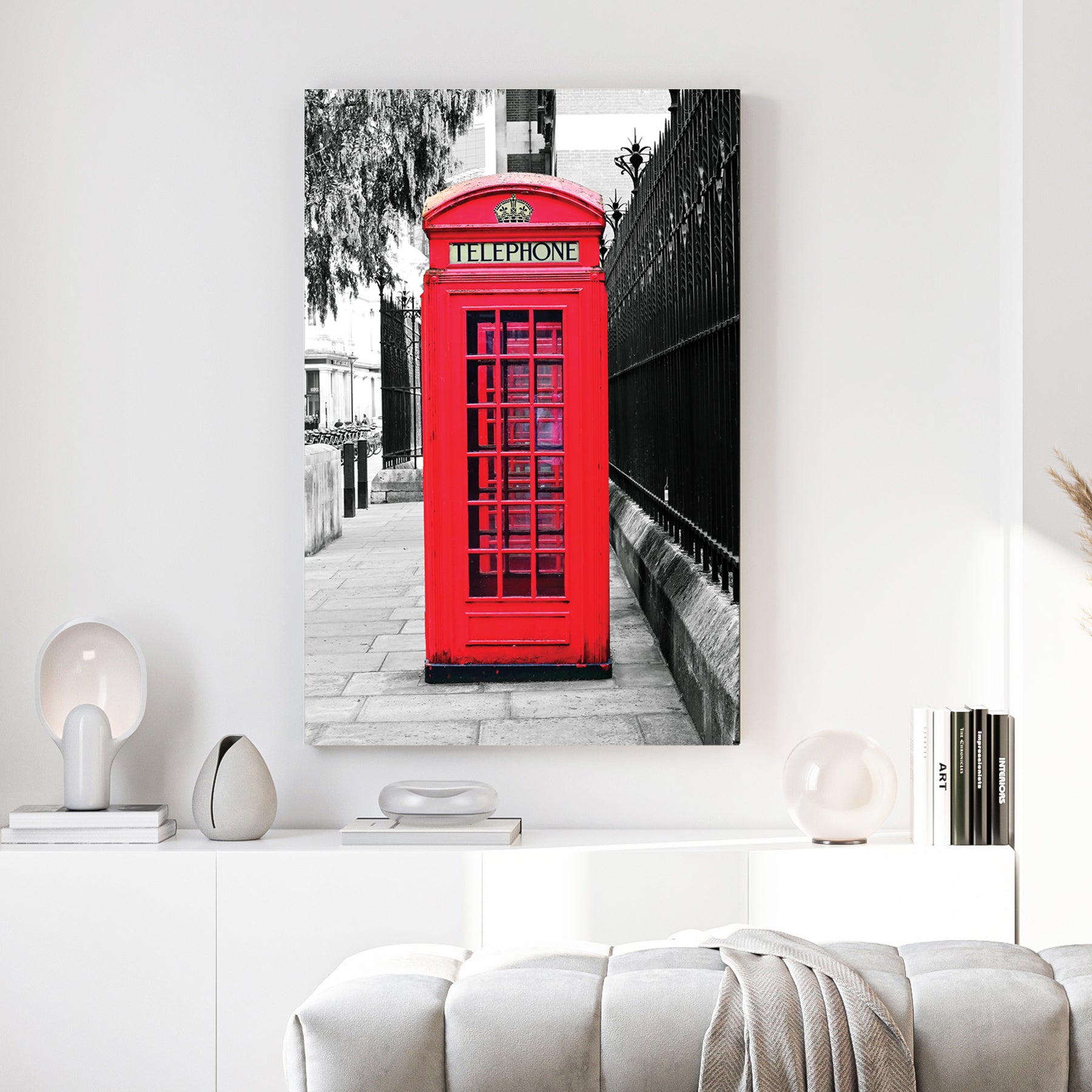 London Telephone Box canvas wall art print above a sofa in a contemporary living room