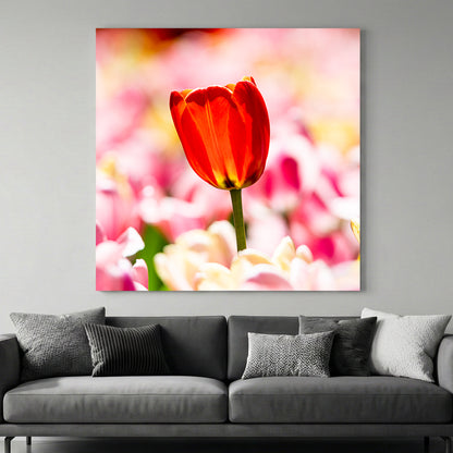 Red Tulip Pastel Bloom canvas wall art print above a sofa in a contemporary living room