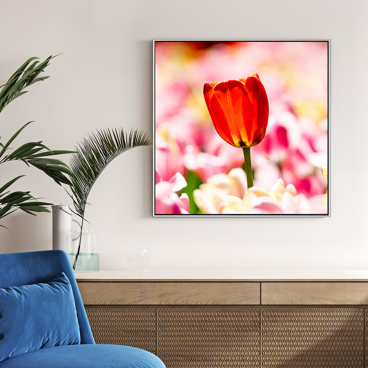 Red Tulip Pastel Bloom canvas wall art print displayed in a styled living room