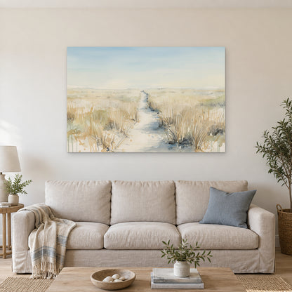 Sandy Dune Path Coastal canvas wall art above a linen sofa with a blue cushion in a bright living room