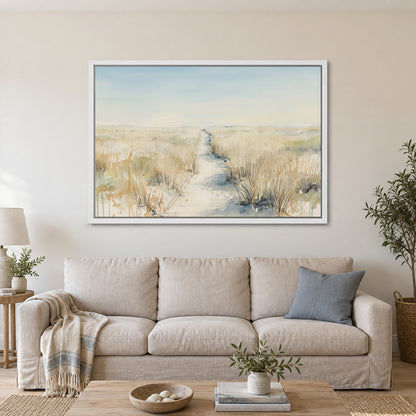 Sandy Dune Path Coastal framed canvas in a white floating frame above a linen sofa with a blue cushion