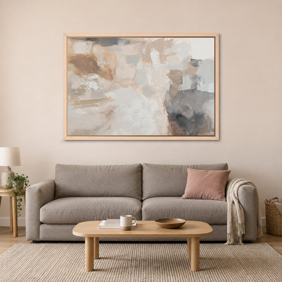 Neutral Abstract Colour Blocks framed canvas in a natural wood floating frame above a taupe sofa on a blush wall