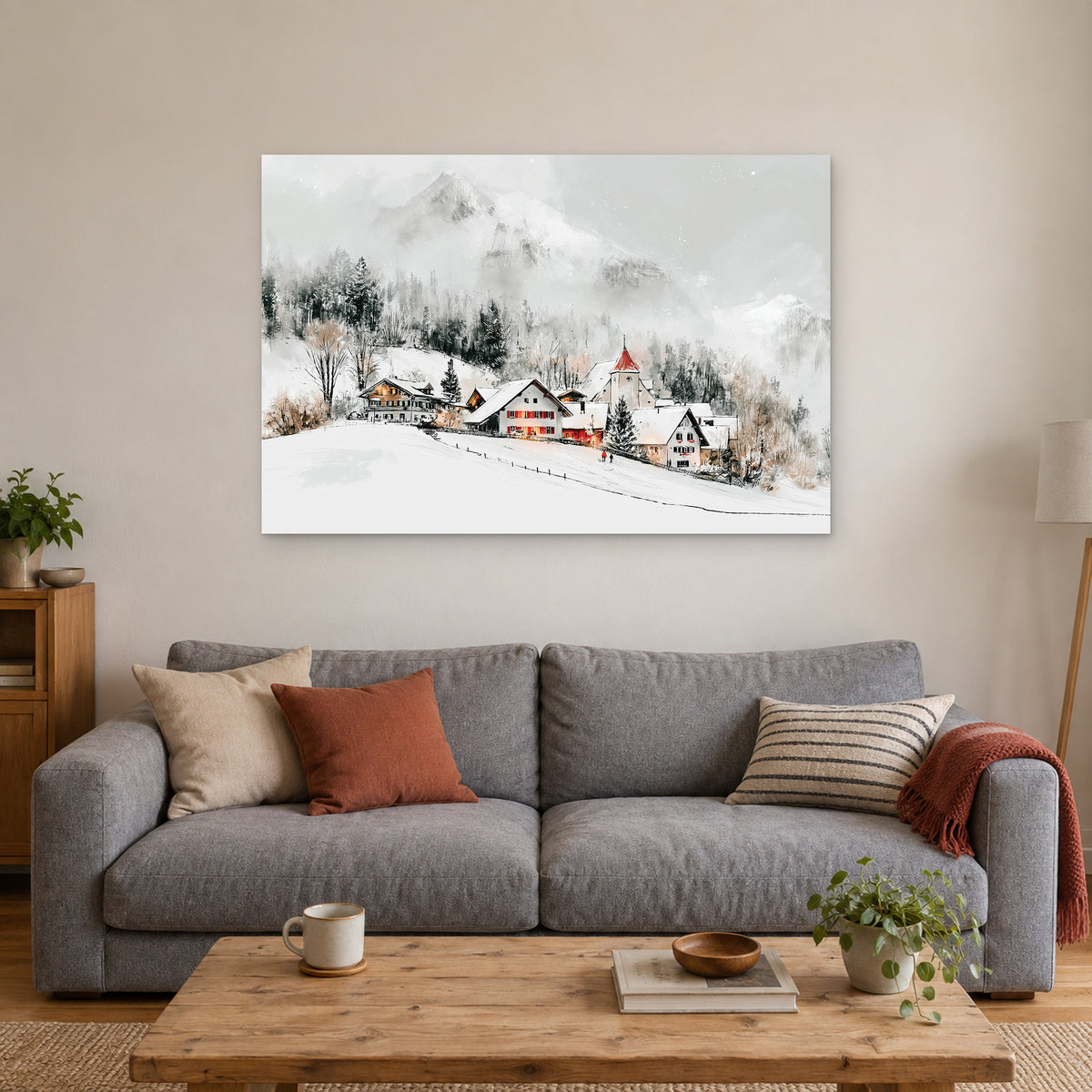 Swiss Alps Winter Chalets canvas wall art above a grey sofa with rust and striped cushions
