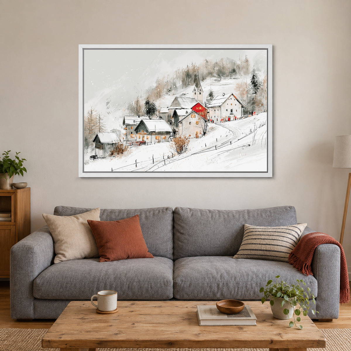 Swiss Alps Hamlet Church framed canvas in a white floating frame above a grey sofa with rust and striped cushions