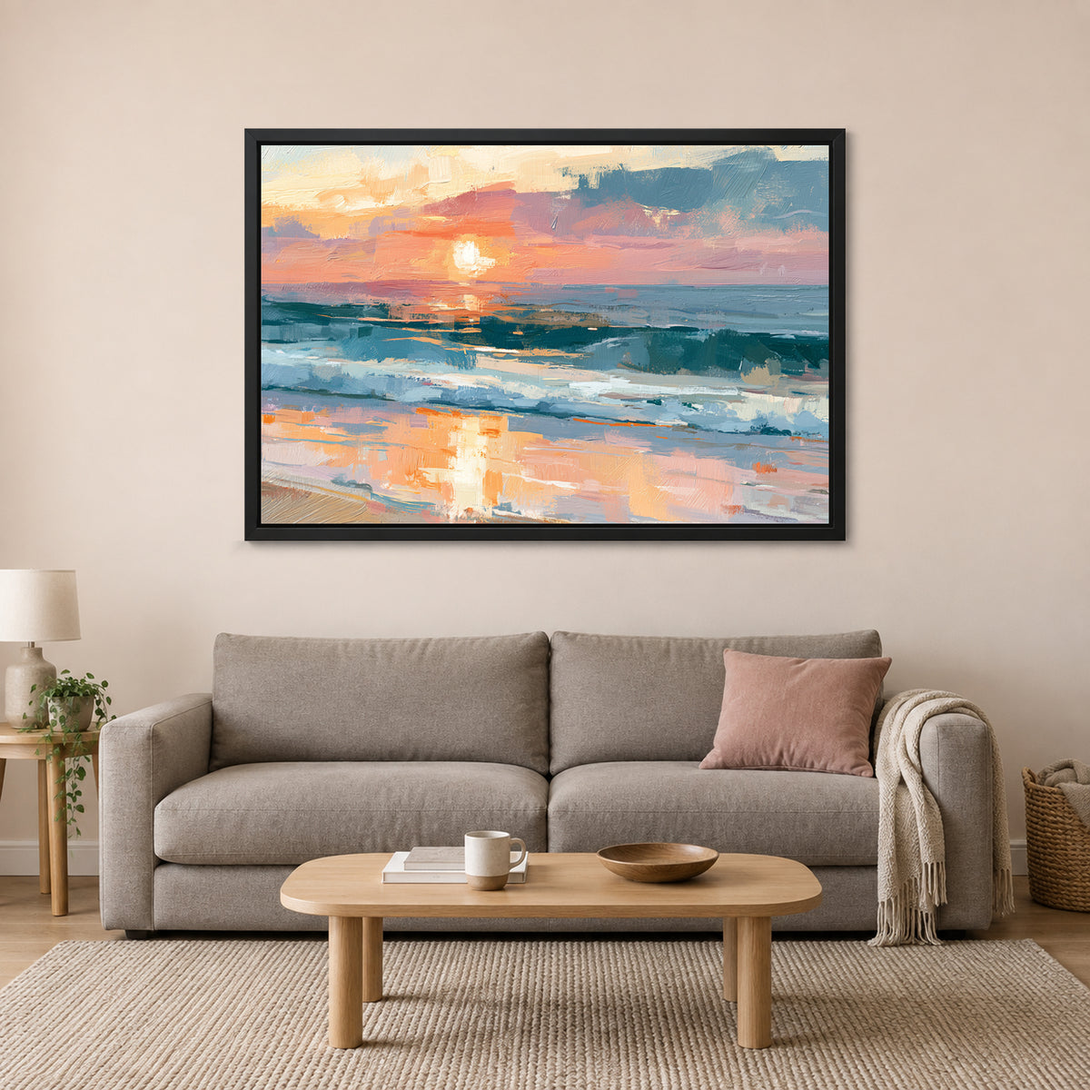 Ocean Sunset Wet Sand framed canvas in a black floating frame above a taupe sofa on a blush wall