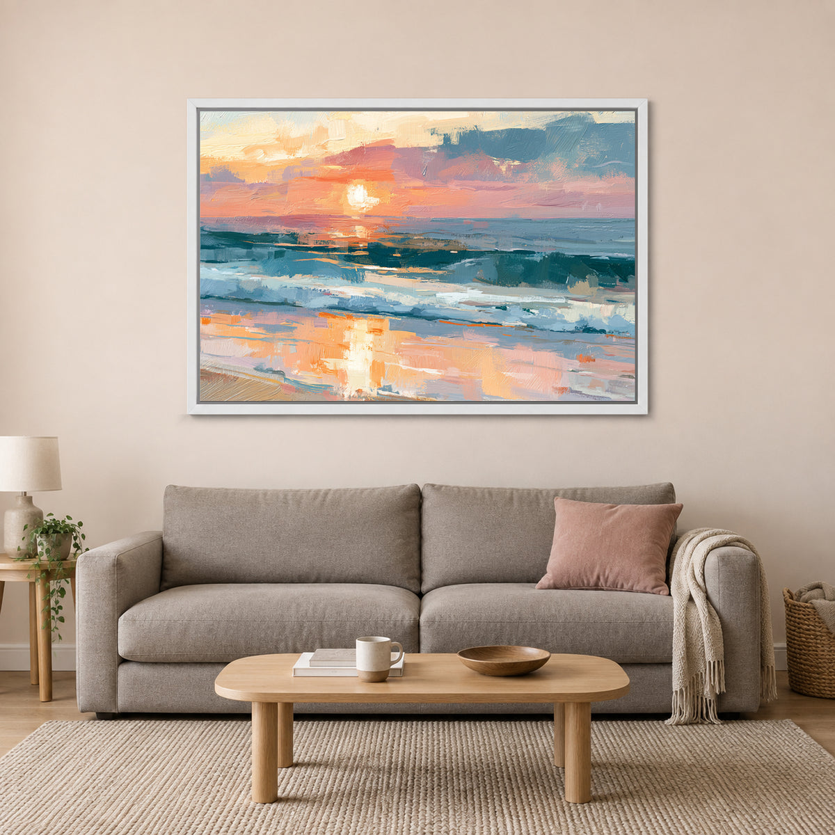 Ocean Sunset Wet Sand framed canvas in a white floating frame above a taupe sofa on a blush wall