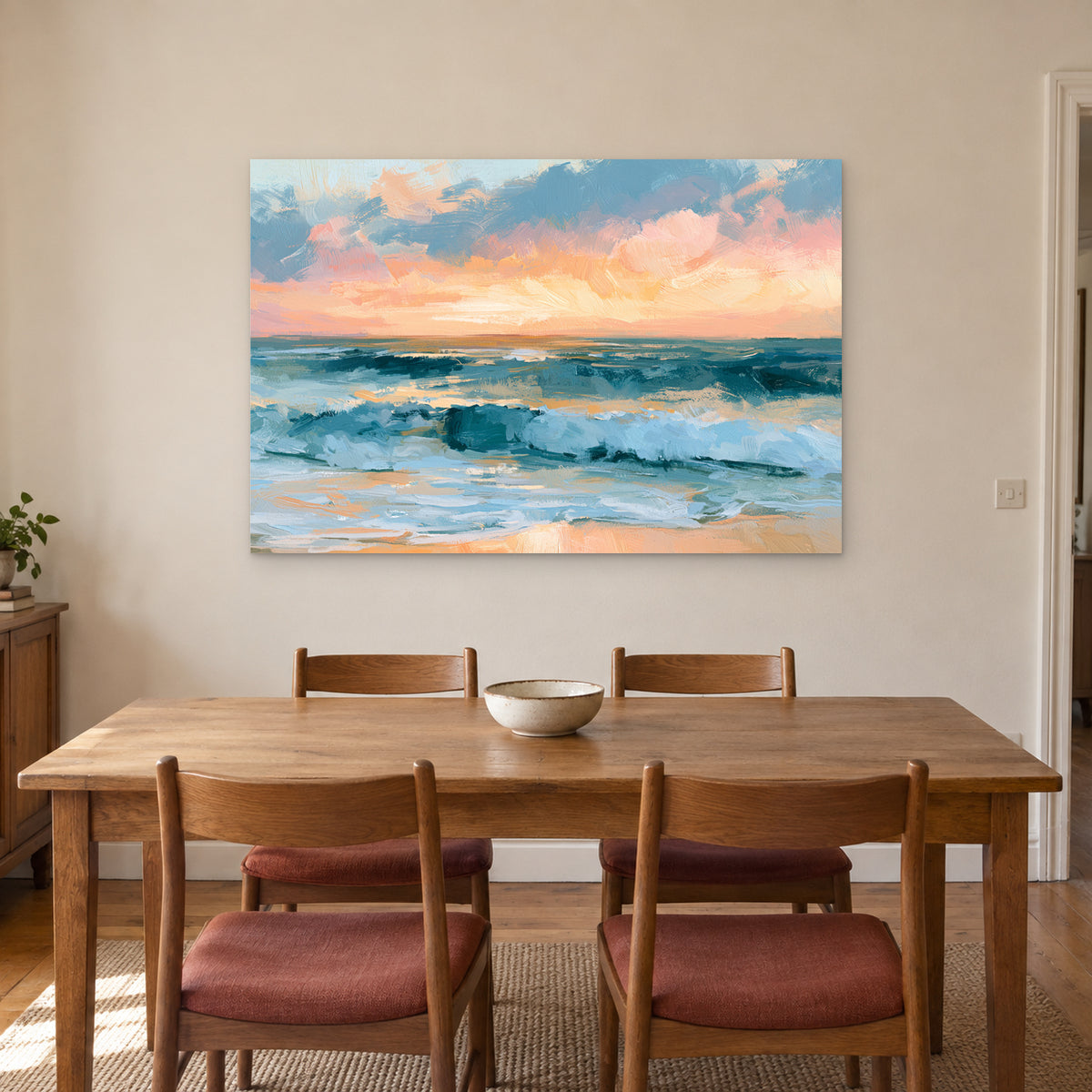 Sunset Surf Cloud Bank canvas wall art above a wooden dining table with rust-cushioned chairs