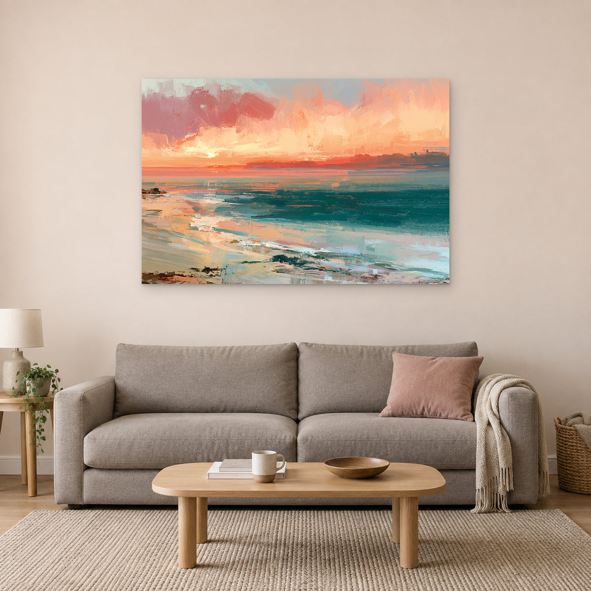 Curving Shoreline Sunset canvas wall art above a taupe sofa on a blush wall