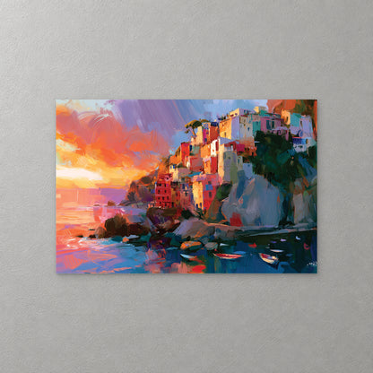 Brightly coloured houses stack up a rocky cliff above a small harbour at sunset, with little boats on dark blue water under an orange and violet sky — canvas wall art print
