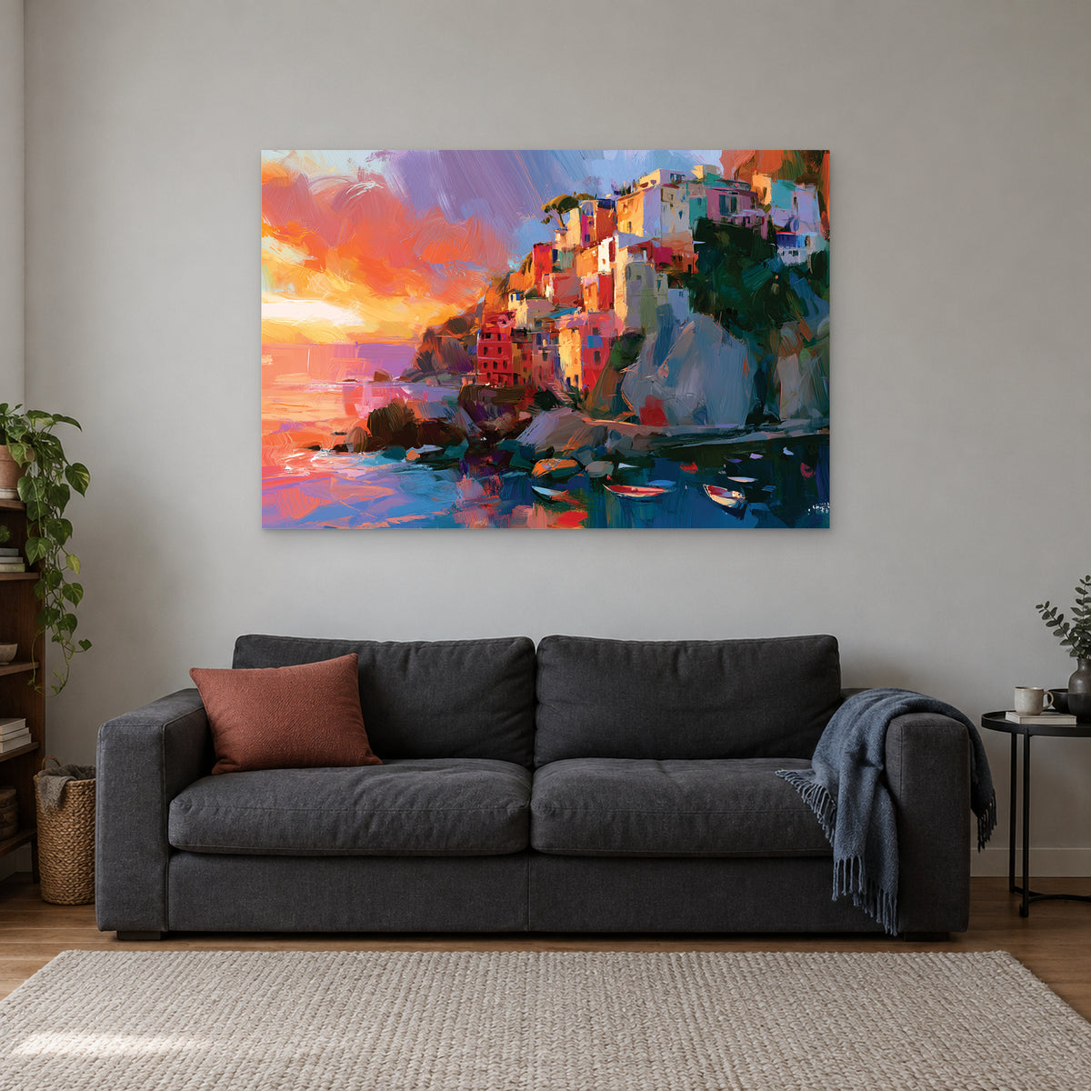 Mediterranean Cliff Harbour Coastal canvas wall art above a charcoal sofa with a rust cushion