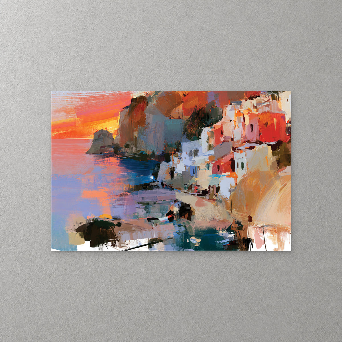 A cliffside town of red, white and ochre houses drops to the sea at sunset, with a rocky headland on the horizon and loose dark strokes along the bottom edge — canvas wall art print