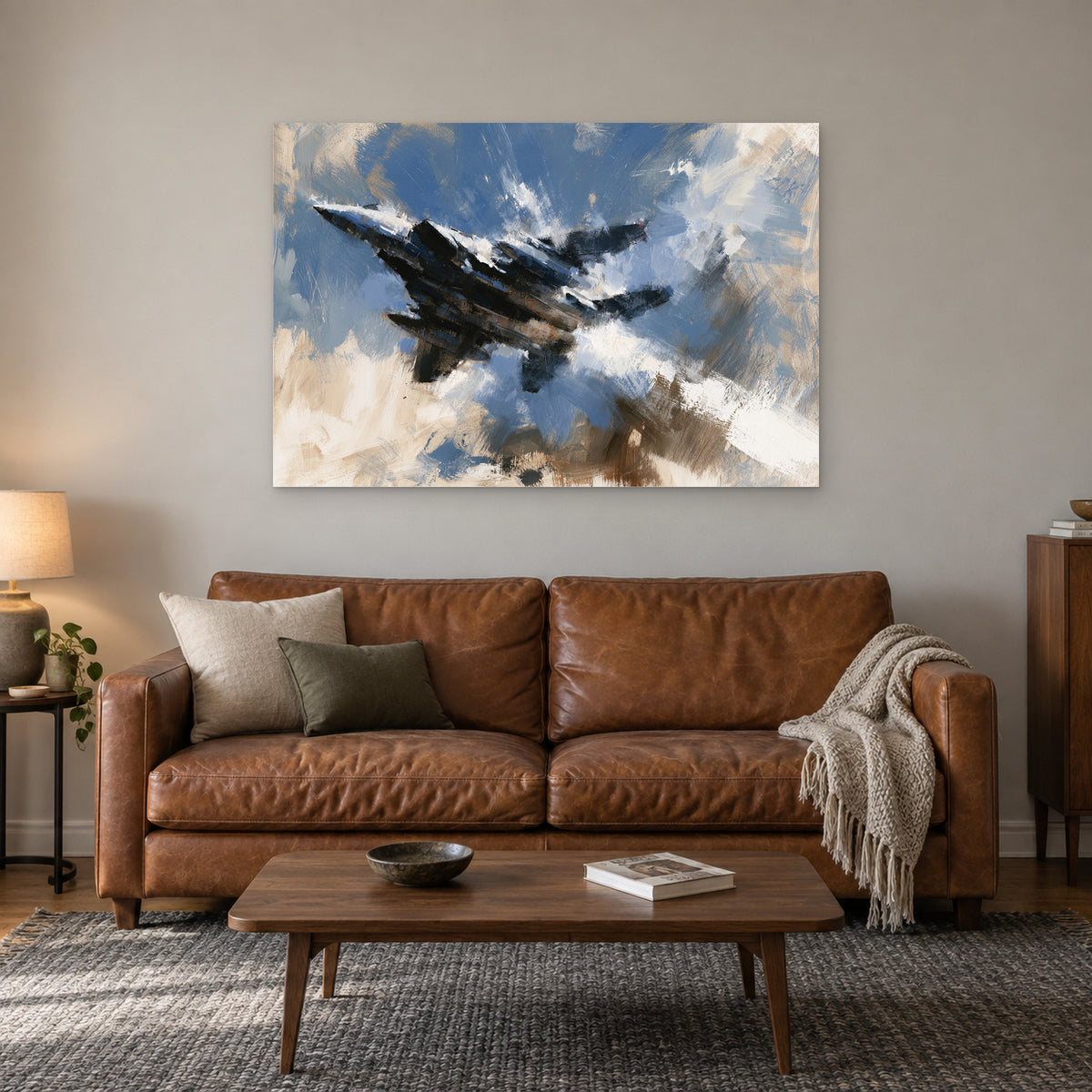Fighter Jet Banking Through Cloud canvas wall art above a cognac leather sofa with a wooden coffee table