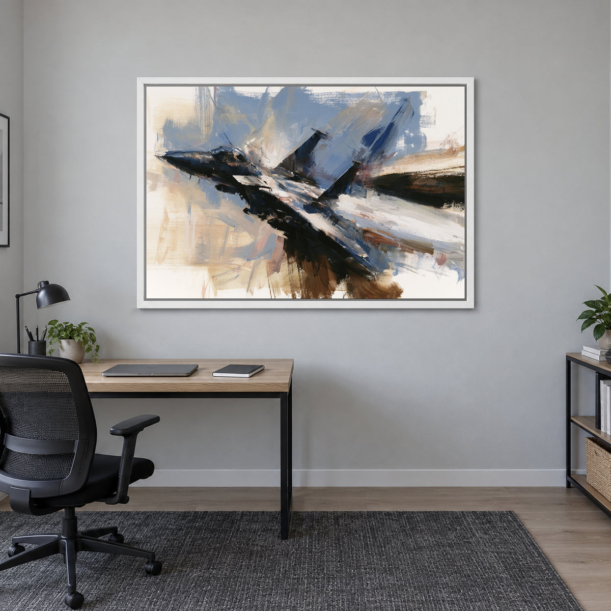 Fighter Jet Head-On Flight framed canvas in a white floating frame above a light wood desk with a black office chair in a home office