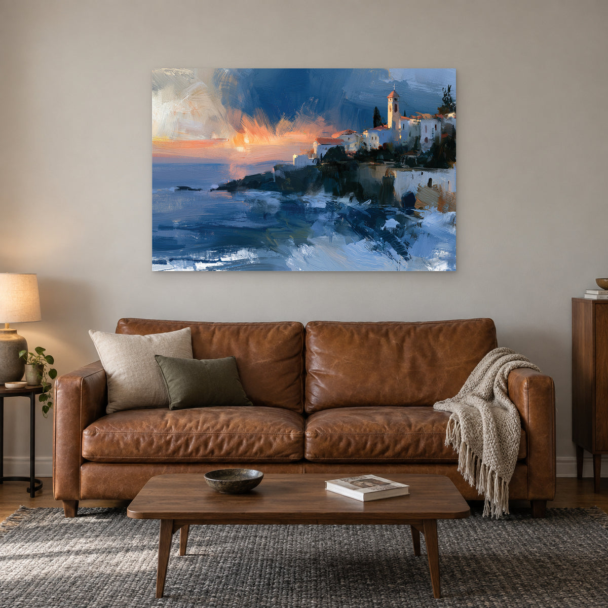 Greek Town Bell Tower Dusk canvas wall art above a cognac leather sofa with a wooden coffee table