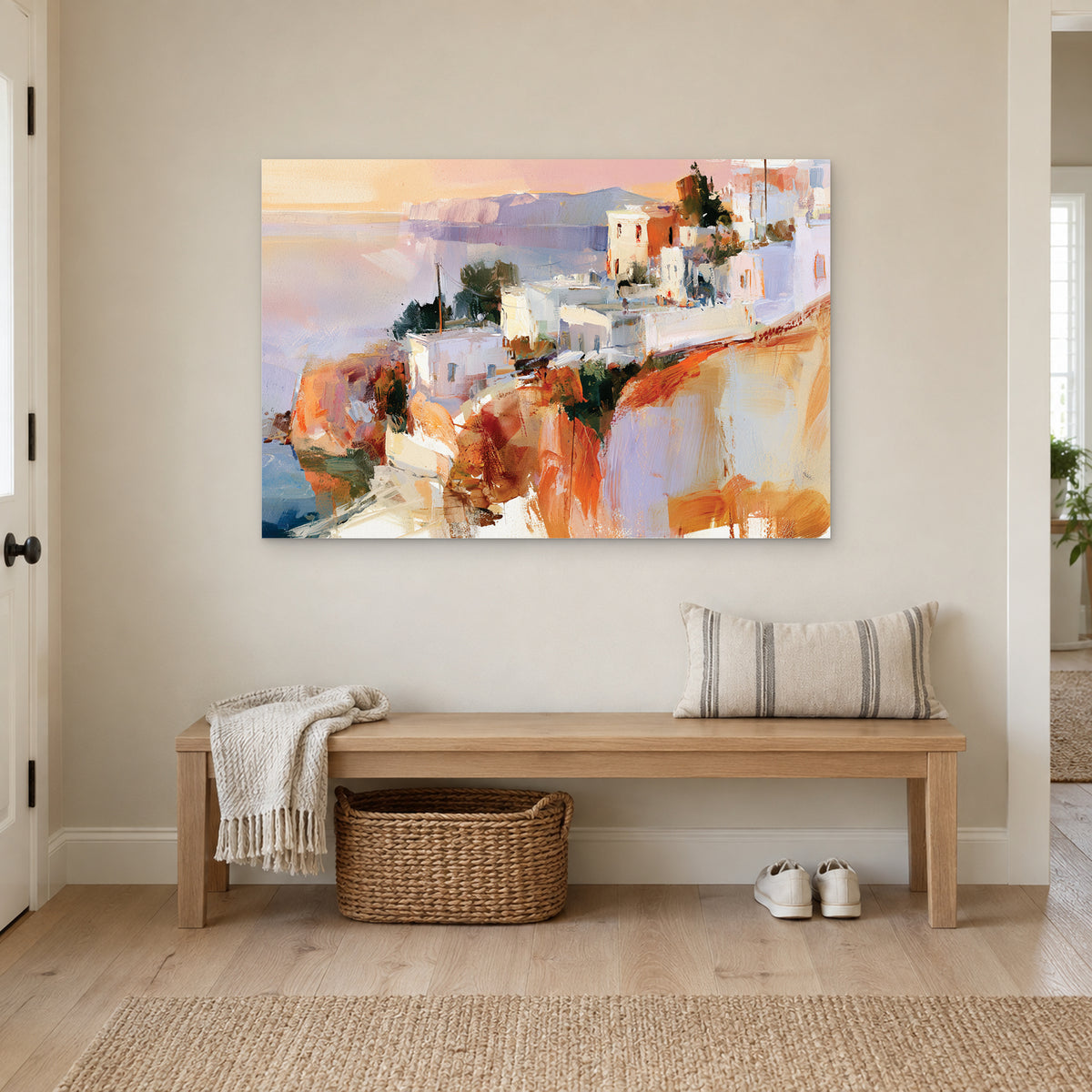 Greek Island Cliff Town canvas wall art above a wooden entryway bench with a woven basket