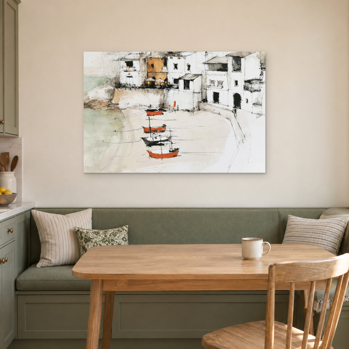 Harbour Houses Beach Boats canvas wall art above a green banquette and wooden table in a breakfast nook