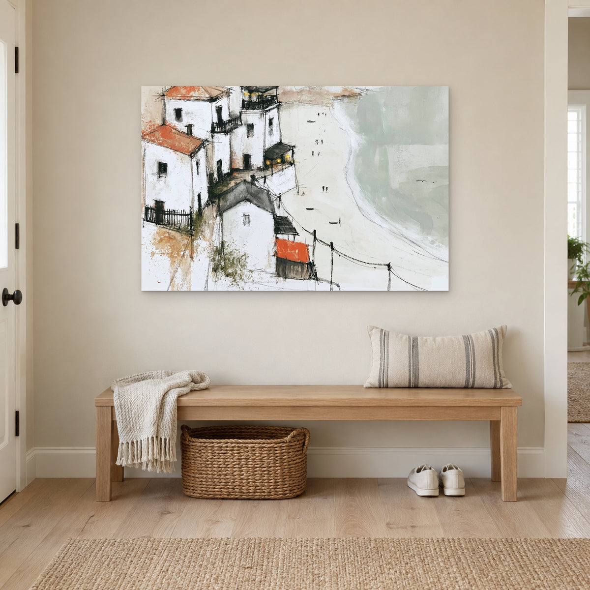 Whitewashed Headland Beach canvas wall art above a wooden entryway bench with a woven basket