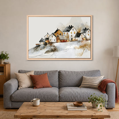 Reine Norway Winter Harbour framed canvas in a natural wood floating frame above a grey sofa with rust and striped cushions