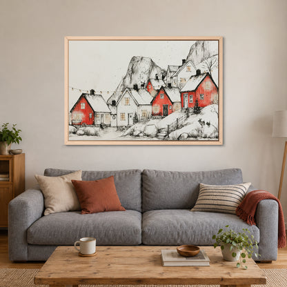 Norwegian Red Cabins Snow framed canvas in a natural wood floating frame above a grey sofa with rust and striped cushions
