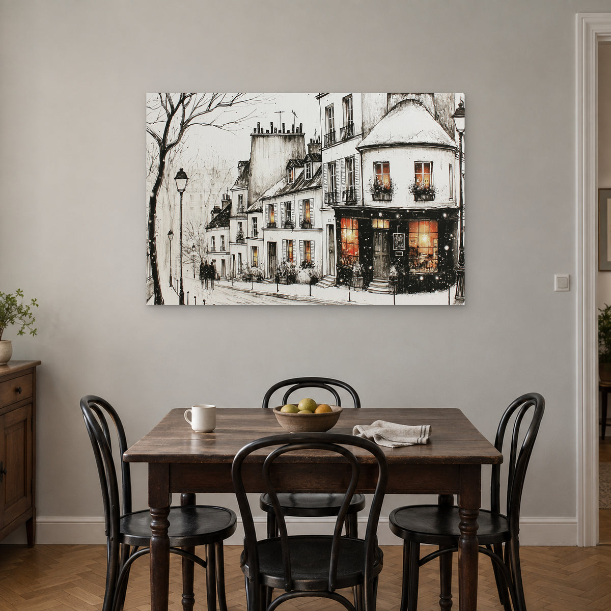 Paris Corner Shop Snow canvas wall art above a small wooden dining table with black bentwood chairs