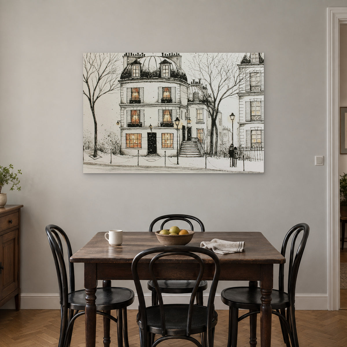 Paris Townhouse Snow canvas wall art above a small wooden dining table with black bentwood chairs