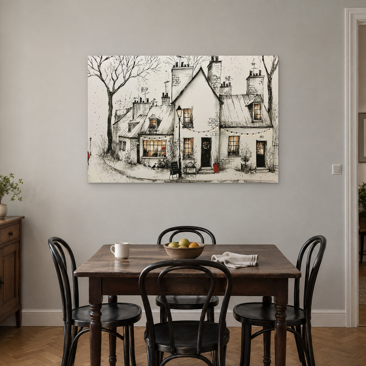 Paris Corner Cafe Snow canvas wall art above a small wooden dining table with black bentwood chairs