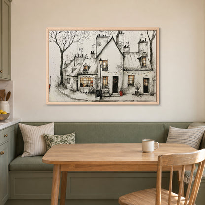 Paris Corner Cafe Snow framed canvas in a natural wood floating frame above a green banquette and wooden table in a breakfast nook
