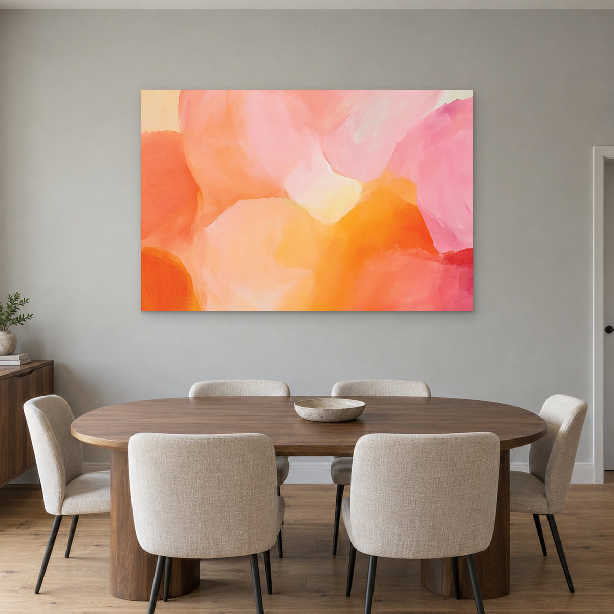 Soft Abstract Colour Forms canvas wall art above an oval wooden dining table with cream upholstered chairs