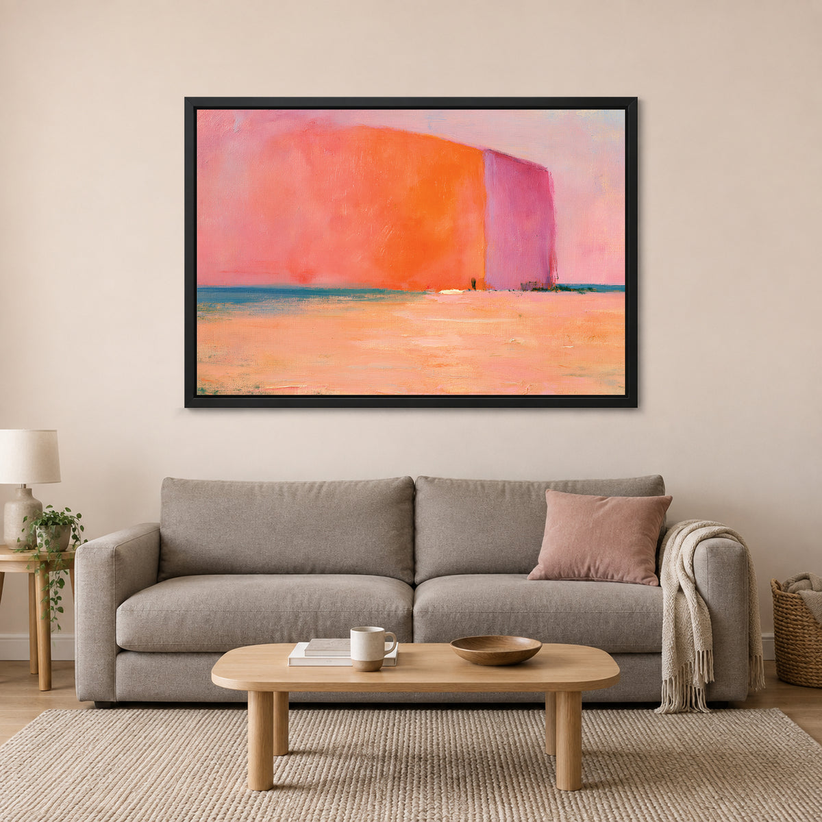 Minimalist Coral Block Horizon framed canvas in a black floating frame above a taupe sofa on a blush wall
