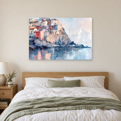 Cinque Terre Cliff Houses Coastal canvas wall art above a bed with white linens and a sage throw