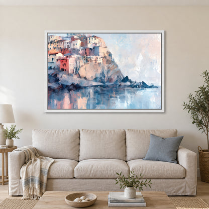 Cinque Terre Cliff Houses Coastal framed canvas in a white floating frame above a linen sofa with a blue cushion