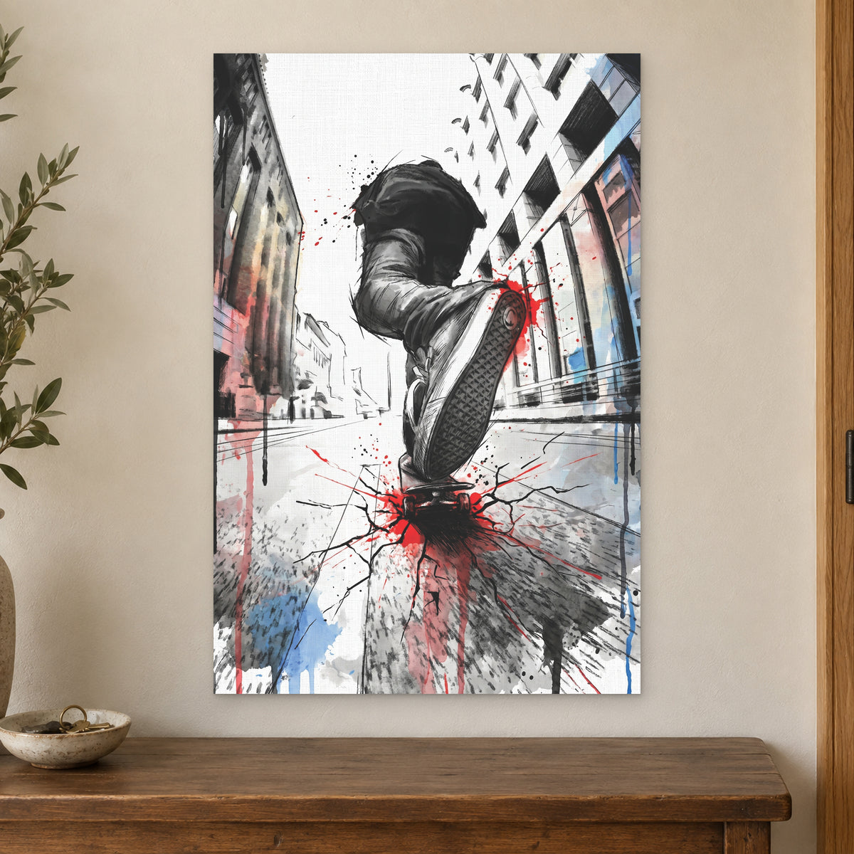 Skateboard Street Trick canvas wall art on a cream wall above a wooden sideboard beside a door frame
