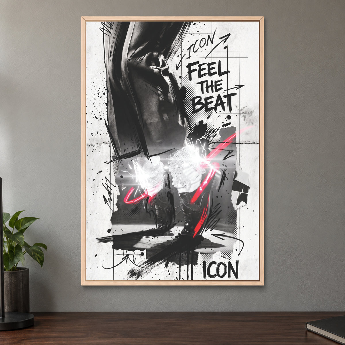 Michael Jackson Icon Loafers framed canvas in a natural wood floating frame on a taupe wall above a dark walnut sideboard with a potted plant