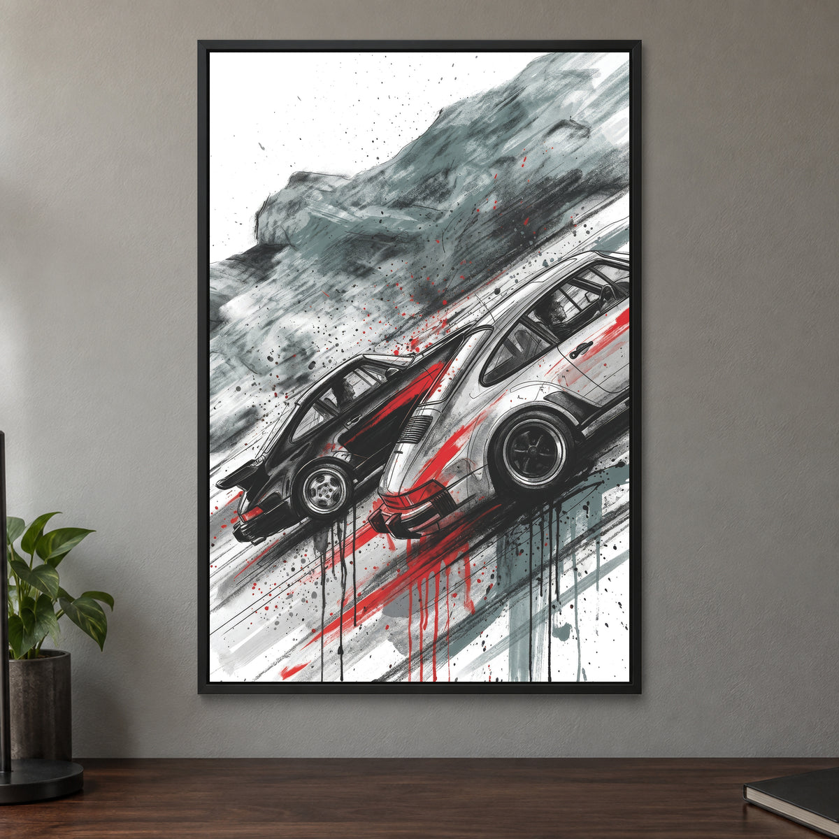 Porsche 911 Turbo Chase framed canvas in a black floating frame on a taupe wall above a dark walnut sideboard with a potted plant