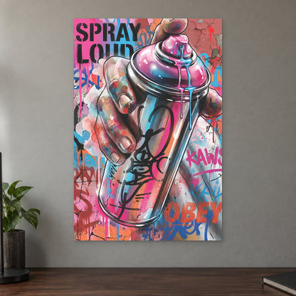Spray Can Graffiti Street Art canvas wall art on a taupe wall above a dark walnut sideboard with a potted plant