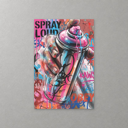 A hand grips a pink and blue spray can dripping paint, set against a graffiti wall with the words Spray Loud in black stencil — canvas wall art print