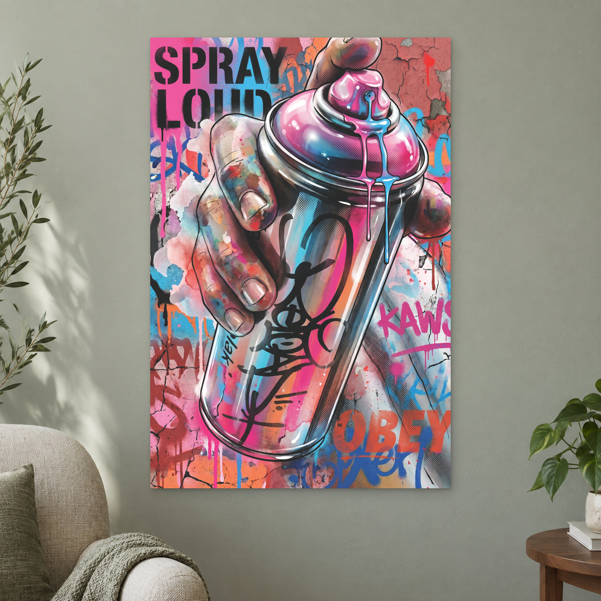 Spray Can Graffiti Street Art canvas wall art on a sage green wall beside a cream armchair