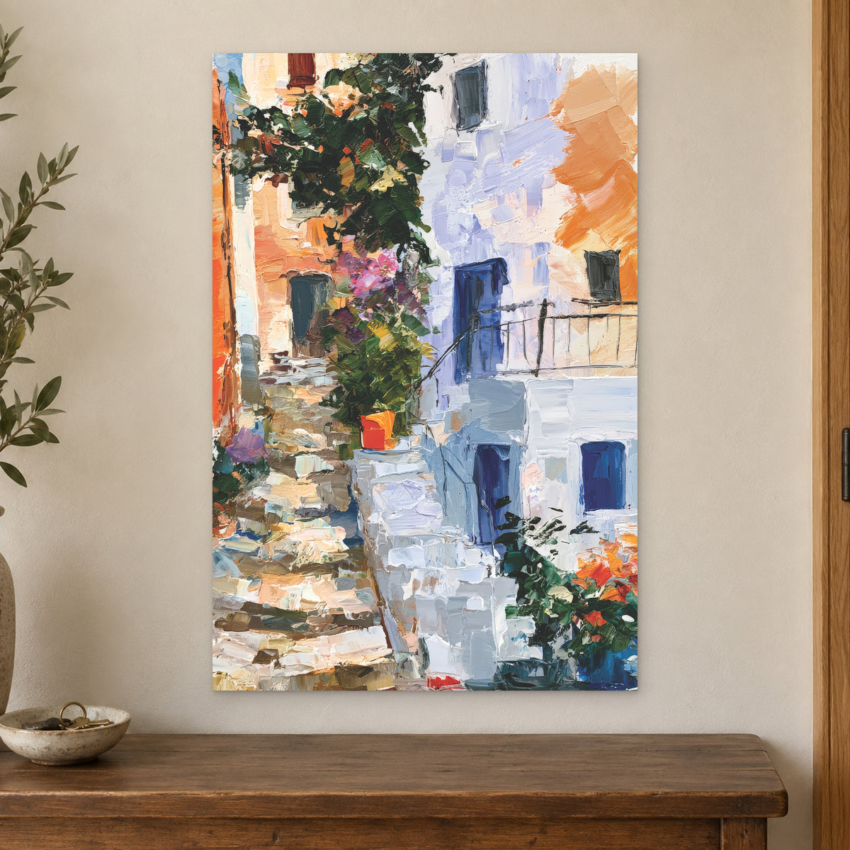 Whitewashed Alley Stone Steps canvas wall art on a cream wall above a wooden sideboard beside a door frame