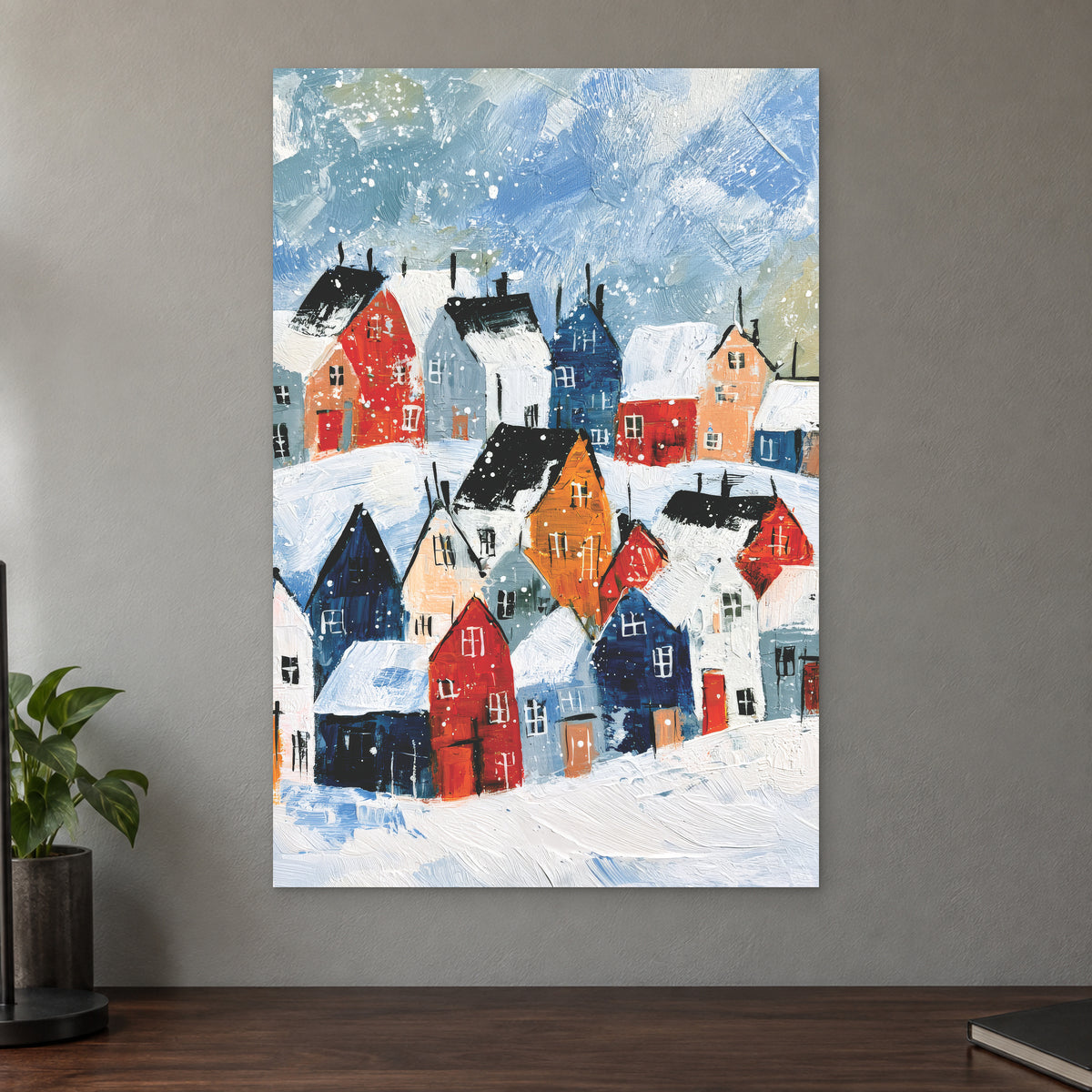 Snowfall Over the Rooftops canvas wall art on a taupe wall above a dark walnut sideboard with a potted plant