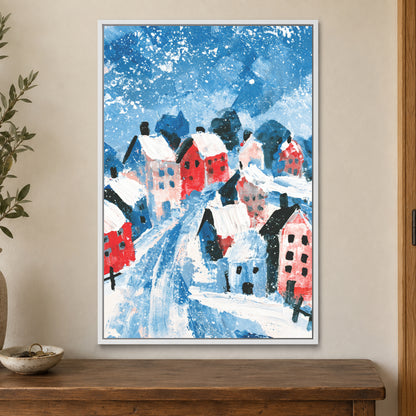Winter Lane Between the Houses framed canvas in a white floating frame on a cream wall above a wooden sideboard beside a door frame