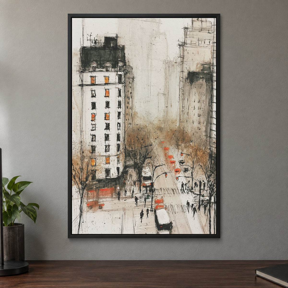 New York Cabs From Above framed canvas in a black floating frame on a taupe wall above a dark walnut sideboard with a potted plant