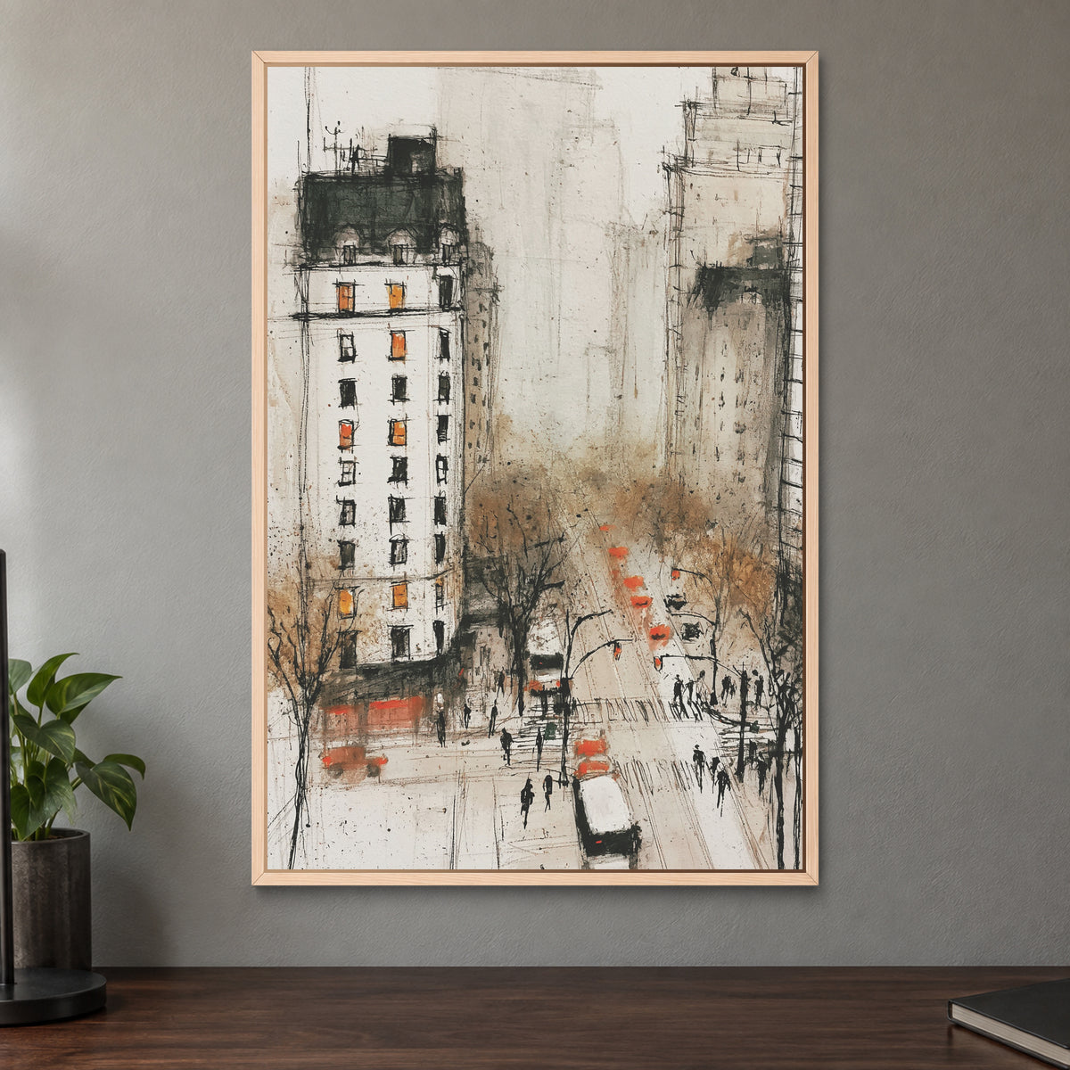 New York Cabs From Above framed canvas in a natural wood floating frame on a taupe wall above a dark walnut sideboard with a potted plant