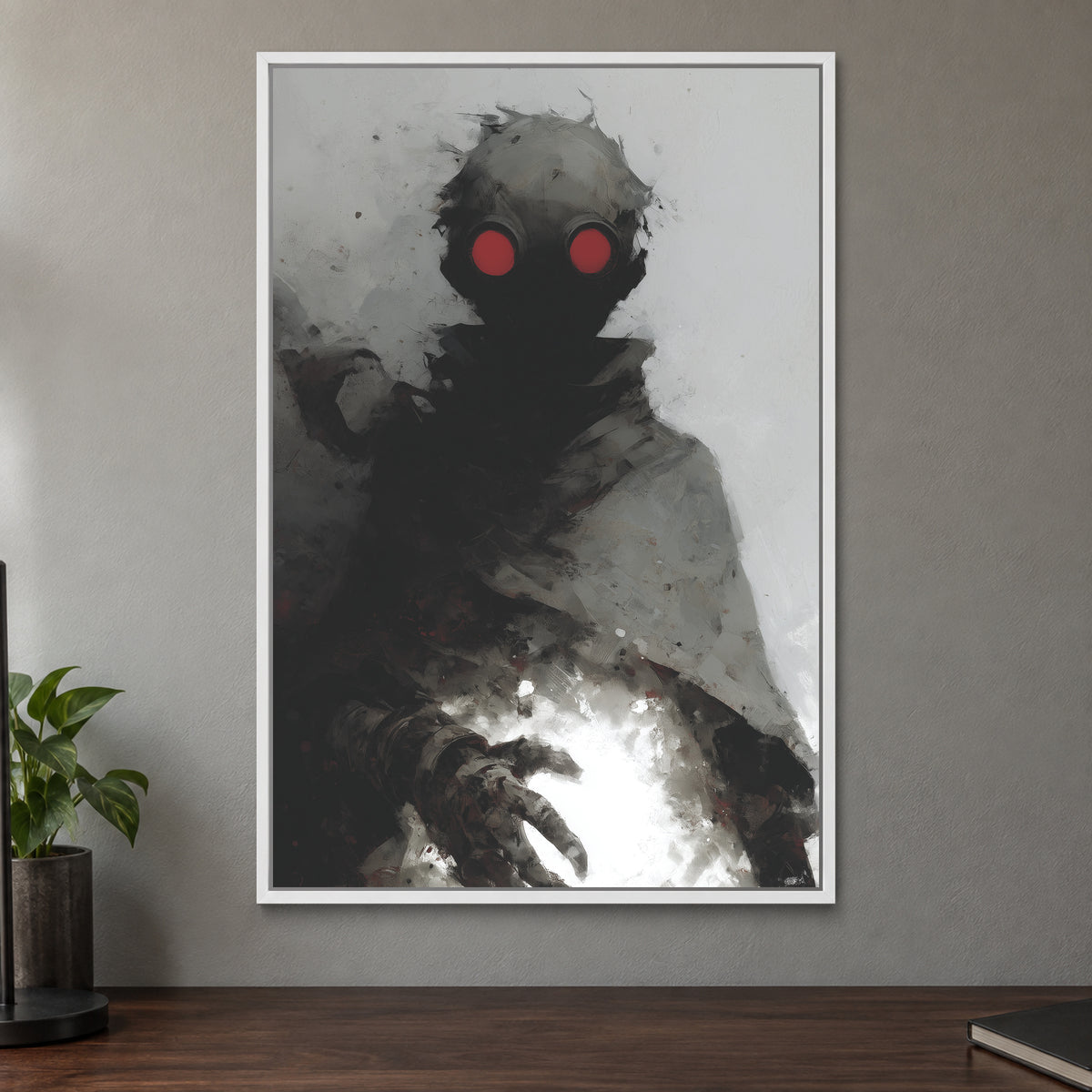 Wasteland Gas Mask Figure framed canvas in a white floating frame on a taupe wall above a dark walnut sideboard with a potted plant