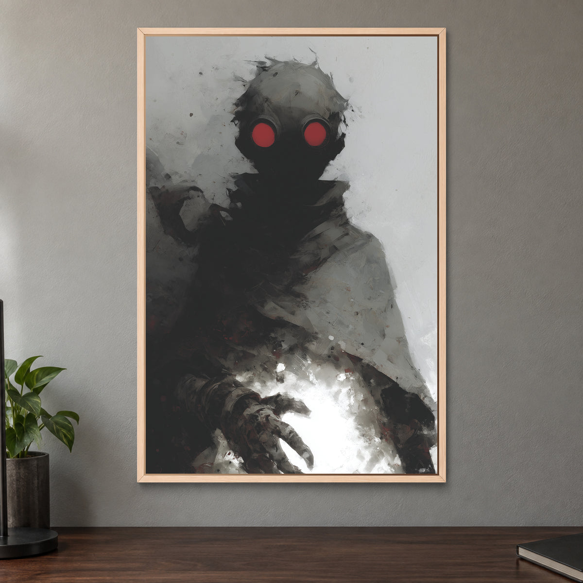 Wasteland Gas Mask Figure framed canvas in a natural wood floating frame on a taupe wall above a dark walnut sideboard with a potted plant