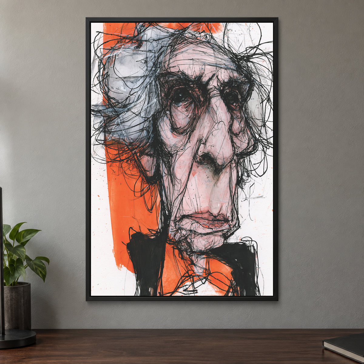 Wild Hair Scribble Portrait framed canvas in a black floating frame on a taupe wall above a dark walnut sideboard with a potted plant