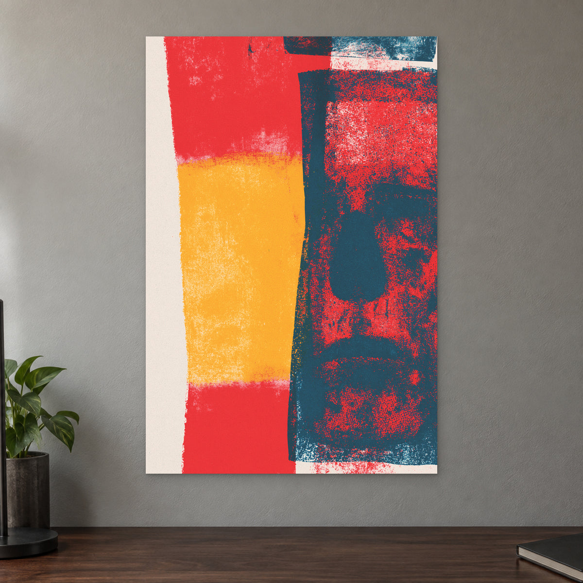 Almost a Face Abstract canvas wall art on a taupe wall above a dark walnut sideboard with a potted plant