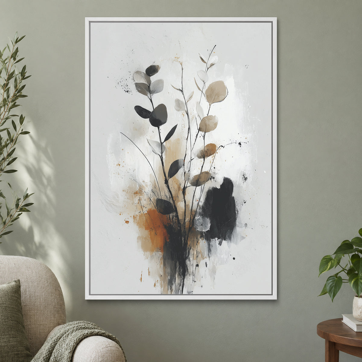 Eucalyptus Stems Minimalist framed canvas in a white floating frame on a sage green wall beside a cream armchair